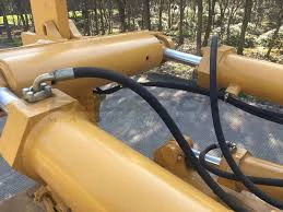 Hydraulic tilt cylinder components